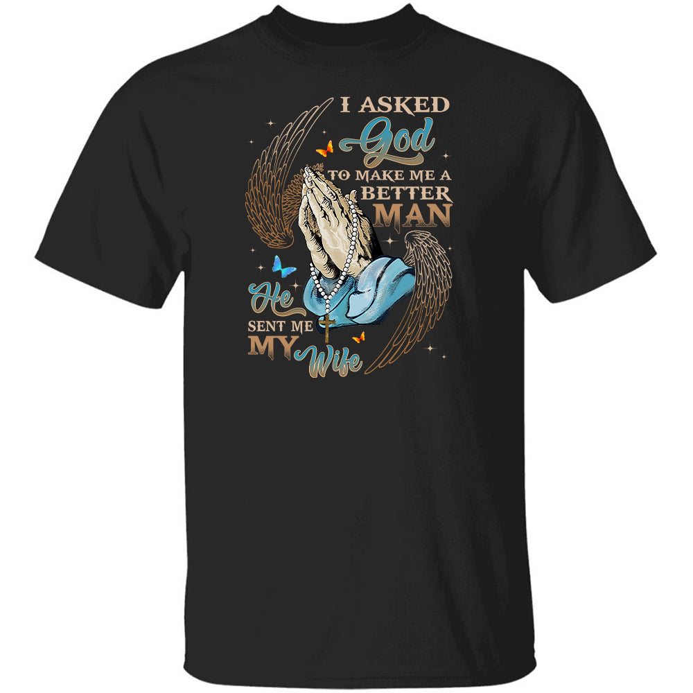 Praying hands, Angel wings, I asked God to make make me a better man, He sent me my wife - Jesus Black Apparel